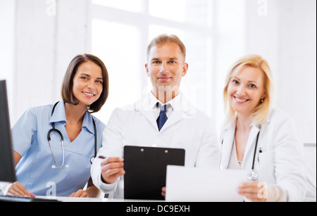 team or group of doctors on meeting Stock Photo