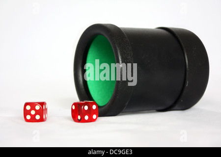 Black Dice Cup with Two Red Dice Stock Photo