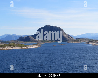 TORGHATTEN MOUNTAIN on Torget Island off the west coast of Norway showing it's famous ice-age hole. Photo Tony Gale Stock Photo