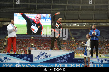 Moscow, Russia. 13th Aug, 2013. Silver medalist Piotr Malachowski (L) of Poland, gold medalist Robert Harting (C) of Germany and bronze medalist Gerd Kanter (R) of Estonia stand on the podium during the medal ceremony of the Men's Discus Throw Event at the 14th IAAF World Championships in Athletics at Luzhniki Stadium in Moscow, Russia, 13 August 2013. Photo: Bernd Thissen/dpa/Alamy Live News Stock Photo