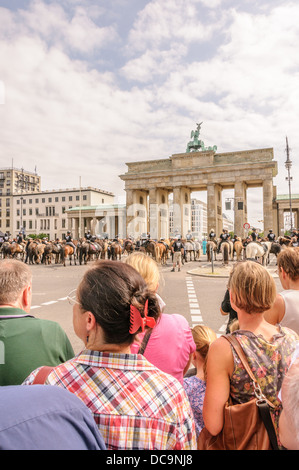 Many people on the 17th of June Street and Square and Brandenburg Gate during IPZV Icelandic horses world championship, Berlin Stock Photo