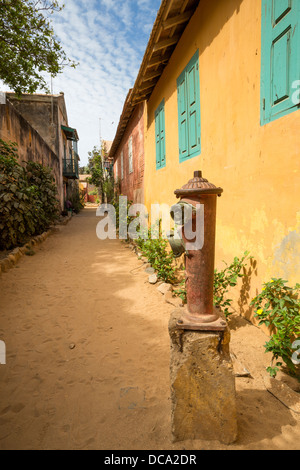 Old Fire Hydrant on a Residential Street, Goree Island, Senegal. Stock Photo