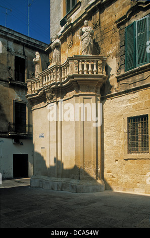 Propylaea with three statues at the entrance of the Piazza del Duomo in Lecce. Stock Photo