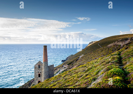 The coast at St Agnes in Cornwall with the Wheal Coates tin mine perched on the edge of the cliffs. Stock Photo