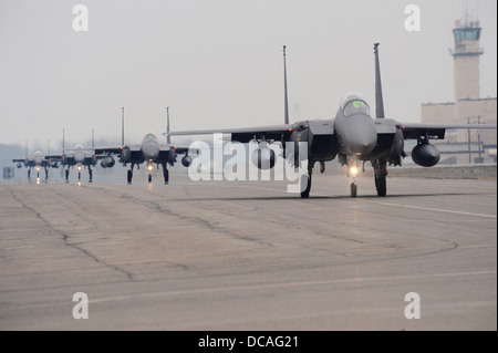 Republic of Korea Air Force F-15K Slam Eagles taxis down the runway prior to taking off during Red Flag-Alaska 13-3, Aug. 12, 2013, Eielson Air Force Base, Alaska. The F-15K is equipped with state-of-the-art mission equipment to conduct air-to-ground, air Stock Photo