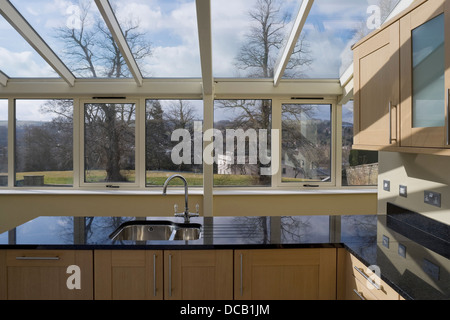 View through uncurtained window in kitchen of Castle Hill homes, Bakewell, Derbyshire, Peak District National Park, Lathams Stock Photo