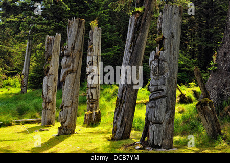 SGang Gwaay Island Gwaii Haanas National Park Mortuary Poles  Haida Gwaii Queen Charlotte Islands  British Columbia Canada Stock Photo