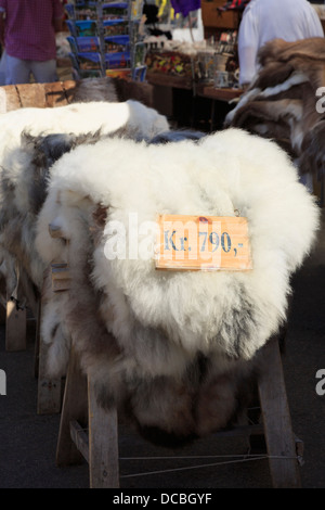 Reindeer fur skins on sale on a market stall in Bergen, Hordaland, Norway, Scandinavia Stock Photo