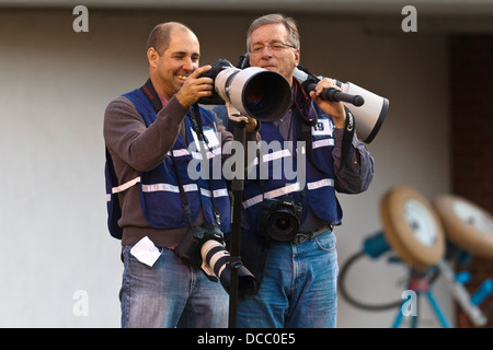 Photographers Andrew Shurtleff (left) and Steve Helber (right) during the third quarter at Scott Stadium.  North Carolina State Stock Photo