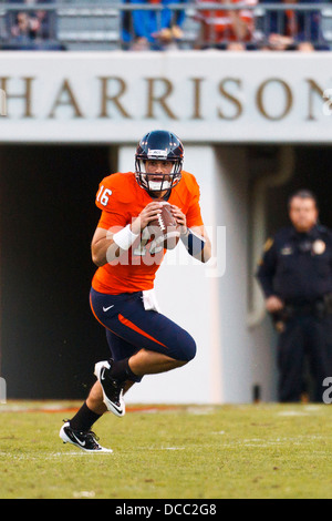 Virginia Cavaliers quarterback Michael Rocco (16) scrambles out of the pocket against the Georgia Tech Yellow Jackets during the Stock Photo