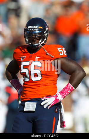 Virginia Cavaliers defensive end Cam Johnson (56) before a play against the Georgia Tech Yellow Jackets during the first quarter Stock Photo