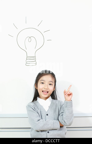 a student with a light bulb Stock Photo