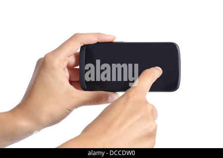 Woman hands touching the screen of a smartphone isolated on a white background Stock Photo