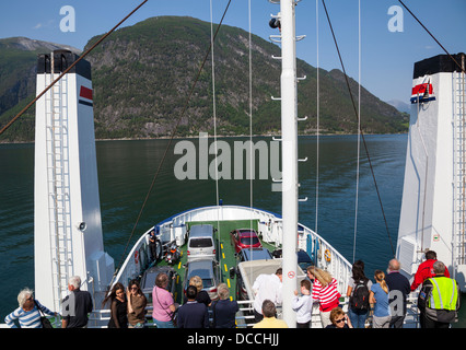 Car ferry crossing a fjord Stock Photo