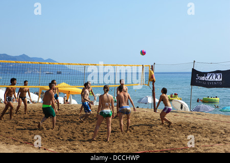 Volleyball being played on Glyfada beach in Corfu, Greece Stock Photo
