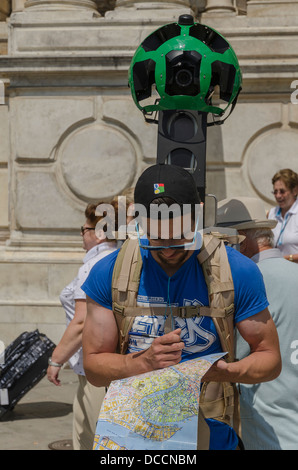 A man employed by Google to map the Streets and Canals of Venice, Italy on foot  using the Google Trekker Backpack Stock Photo