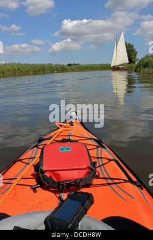 Heritage 1930s Broads yacht from Hunter's Yard on the River Ant, Norfolk, seen from an Advanced Elements AdvancedFrame kayak, Broads National Park Stock Photo