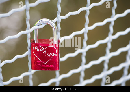 Love Lock on Grey Fencing Stock Photo