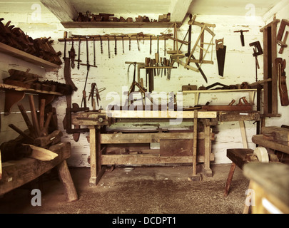 An old repair room in rustic wooden house Stock Photo