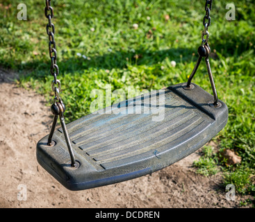 Rubberised Swing Seat In Park Stock Photo