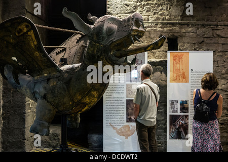 Tourists looking at original copper dragon from the top of the Ghent Belfry tower, East Flanders, Belgium Stock Photo