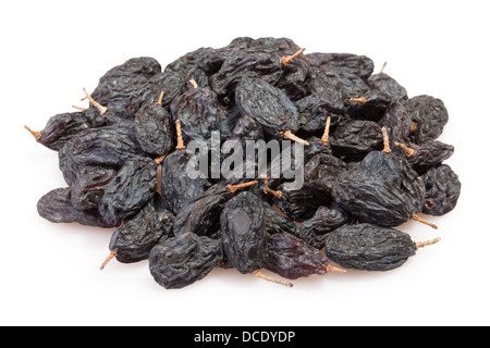 raisins black heap on white background Stock Photo
