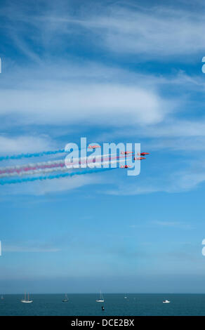 Eastbourne, Sussex, England. 15th Aug, 2013. The RAF Red Arrows aerobatic team performing at high speed Credit:  Malcolm Park/Alamy Live News Stock Photo