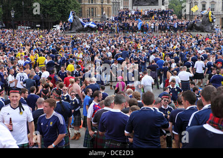 London, UK. 14th Aug, 2013. Scottish football fans at Trafalgar Square in London, England. The Scotland fans gathered ahead of the England versus Scotland friendly match that England won 3-2. Credit:  whyeyephotography.com/Alamy Live News Stock Photo