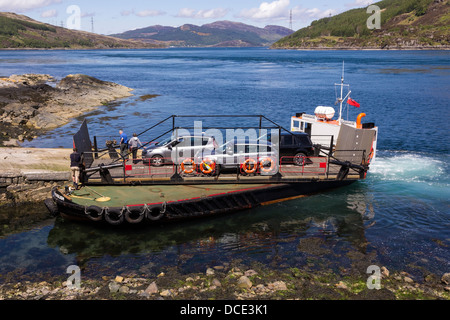 Old, tiny Kylerhea to Glenelg car ferry 'Glenachulish', about to unload cars at Kylerhea jetty, Isle of Skye, Scotland, UK Stock Photo