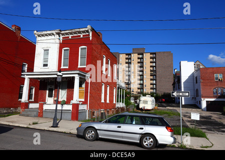 Typical brick house and apartment block in suburbs, Cumberland , Allegany County , Maryland MD, USA Stock Photo