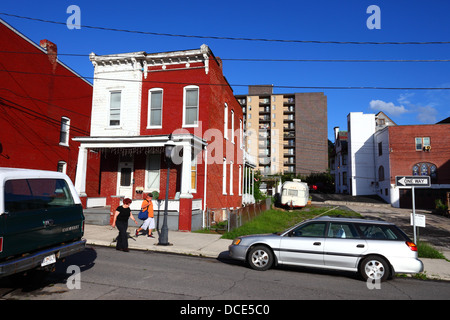 Typical brick house and apartment block in suburbs, Cumberland , Allegany County , Maryland MD, USA Stock Photo