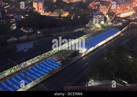 07 Nov 2011 - Mumbai , INDIA:  View of the Lower Parel neighborhood in Mumbai showing the Suburban Railway station.   As the Indian Economy continues to grow a range of Multinational companies are setting up shop in India and looking for office space driving the huge growth in the Construction & Realty business in Mumbai. Stock Photo