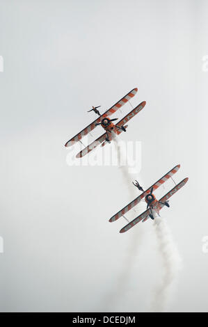 Eastbourne, Sussex, England. 15th Aug, 2013. The Breitling Wingwalkers performing on the opening day of the airshow Credit:  Malcolm Park/Alamy Live News Stock Photo