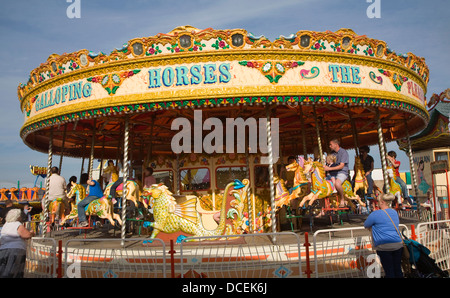 Traditional funfair carousel ride Great Yarmouth, Norfolk, England Stock Photo