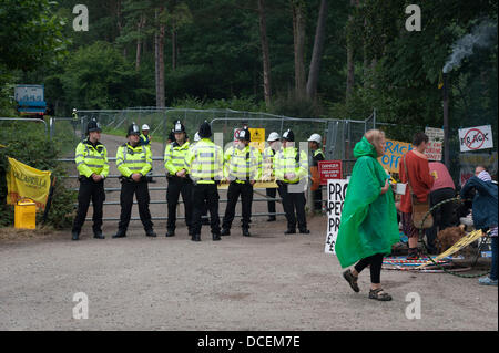 Balcombe, UK. 16th August, 2013. As the anti-fracking protest contingent continues to grow in numbers, police counteract with deploying a heavy presence ahead of a weekend of demonstrations. Yesterday a second camp was set-up on private land near to Balcombe. Credit:  Lee Thomas/Alamy Live News Stock Photo