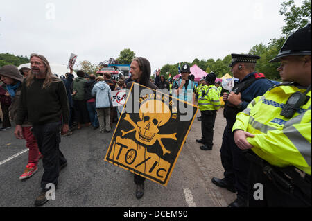 Balcombe, UK. 16th August, 2013. As the anti-fracking protest contingent continues to grow in numbers, police counteract with deploying a heavy presence ahead of a weekend of demonstrations. Yesterday a second camp was set-up on private land near to Balcombe. Credit:  Lee Thomas/Alamy Live News Stock Photo