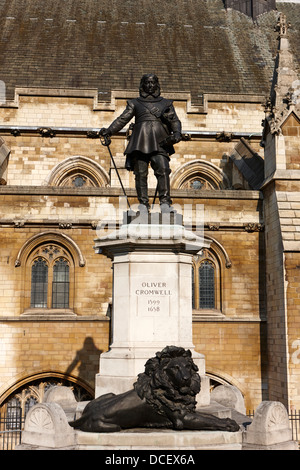 statue of oliver cromwell in front of the houses of parliament London England UK Stock Photo
