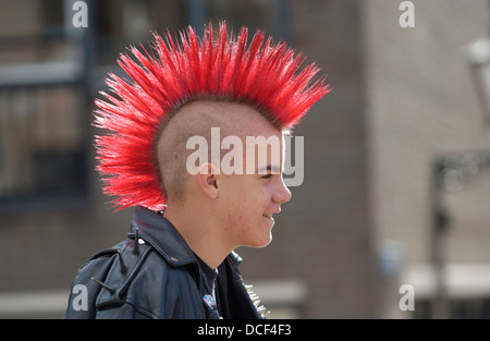 Punk boy with a red mohawk hairstyle Stock Photo, Royalty Free Image ...