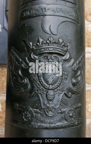 bronze french cannon, the relief of coat of arms of Prince Louis-Charles de Bourbon (1701-1775), Count of Eu, Duke of Aumale, la Stock Photo