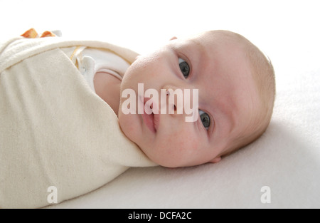 Baby swaddled Stock Photo