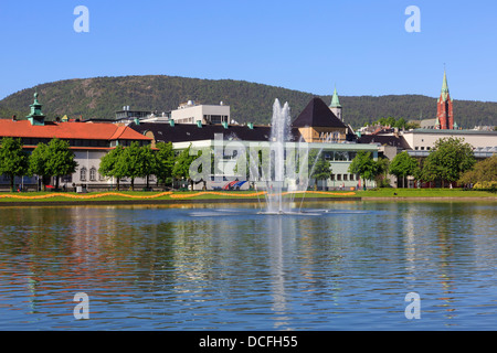 View across Lille Lungegardsvann lake with water fountain to the Kode Art Museums in Bergen, Hordaland, Norway, Scandinavia Stock Photo