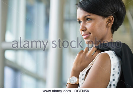 Side profile of beautiful African woman face with curls 