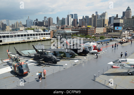 Tourists walking the deck of the Intrepid aircraft carrier, Intrepid Sea, Air and Space Museum, NY Stock Photo