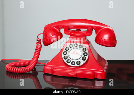 red retro / vintage style telephone of the 1930s-1940s era