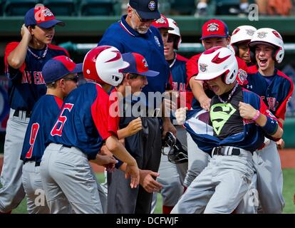 Aberdeen, Maryland, USA.16th Aug, 2013.  - Austin Swanson (New Milford, CT) hits a three-run home run during the New England (New Milford, CT) versus Mid-Atlantic (Hockessin, DE) matchup on Playoff Semifinals Day at the Cal Ripken World Series in Aberdeen, Maryland on August 15, 2013. The blast turned out to be the game winner as New England defeated Mid-Atlantic 5-4. Credit:  ZUMA Press, Inc./Alamy Live News Stock Photo