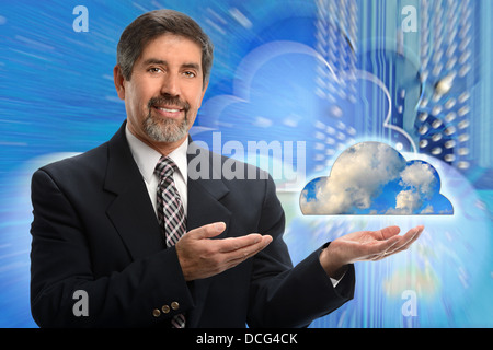 Portrait of senior Hispanic businessman showing cloud computing concept Stock Photo