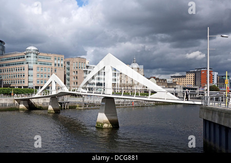 The pedestrian Broomielaw-Tradeston Bridge across River Clyde in Glasgow Scotland also affectionately named 'Squiggly Bridge' Stock Photo
