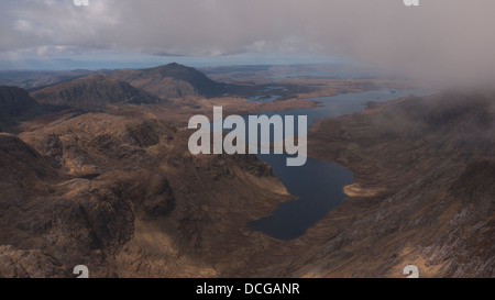 View from the summit of A' Mhaighdean with Beinn Airigh Charr in the distance and Fionn Loch and Dubh Loch below, Scotland UK Stock Photo