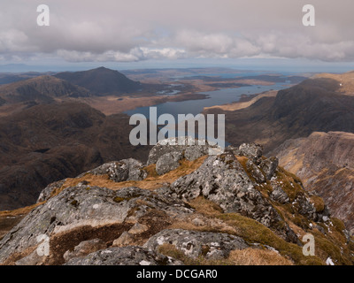 View from the summit of A' Mhaighdean with Beinn Airigh Charr in the distance and Fionn Loch and Dubh Loch below, Scotland UK Stock Photo