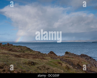 Dramatic rain clouds passing over Enard Bay on the north west coast of Scotland, UK Stock Photo